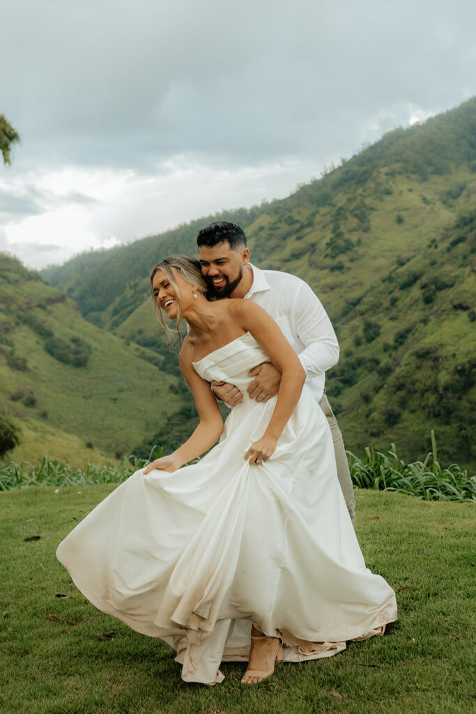 bride and groom hugging