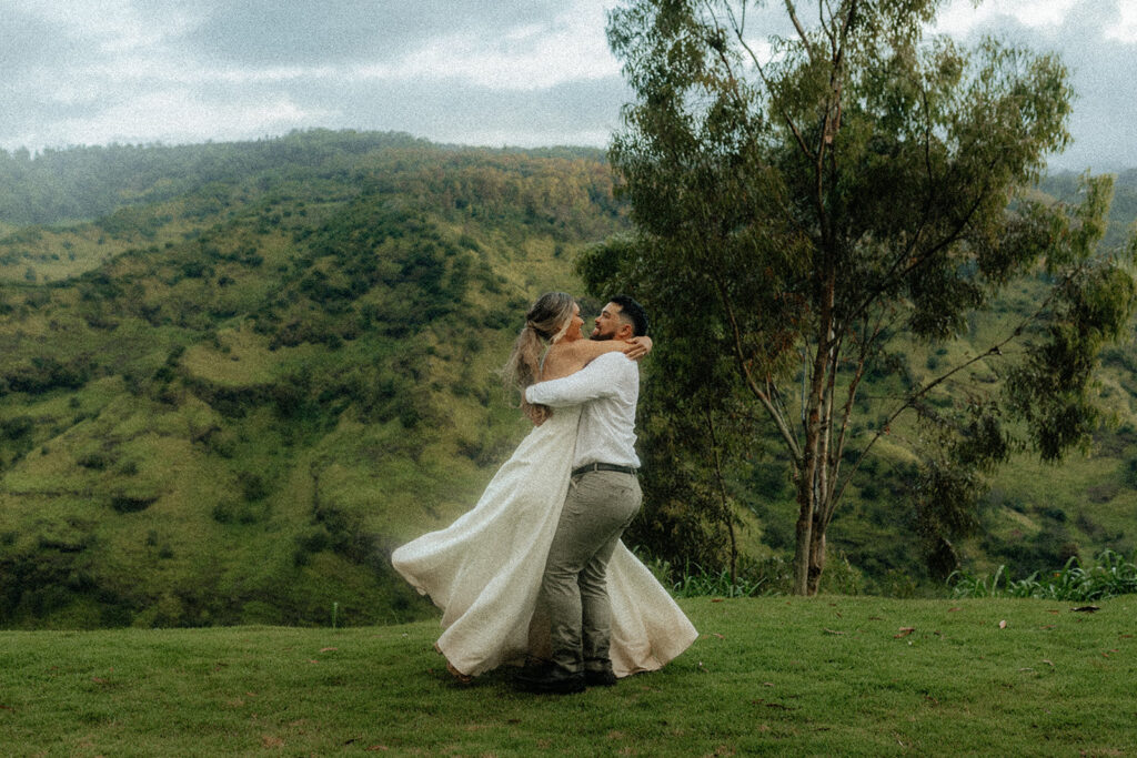 bride and groom playing during their photoshoot