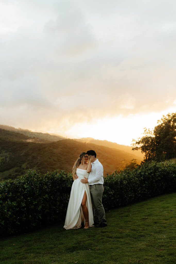 bride and groom hugging during their sunset photoshoot