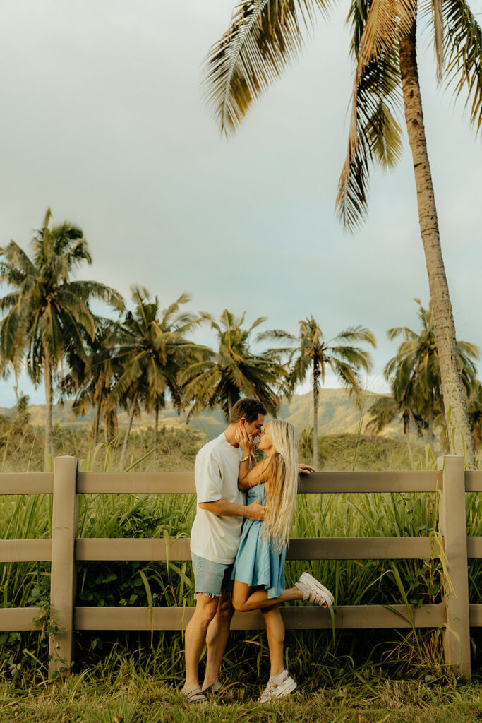 couple kissing at their photoshoot 