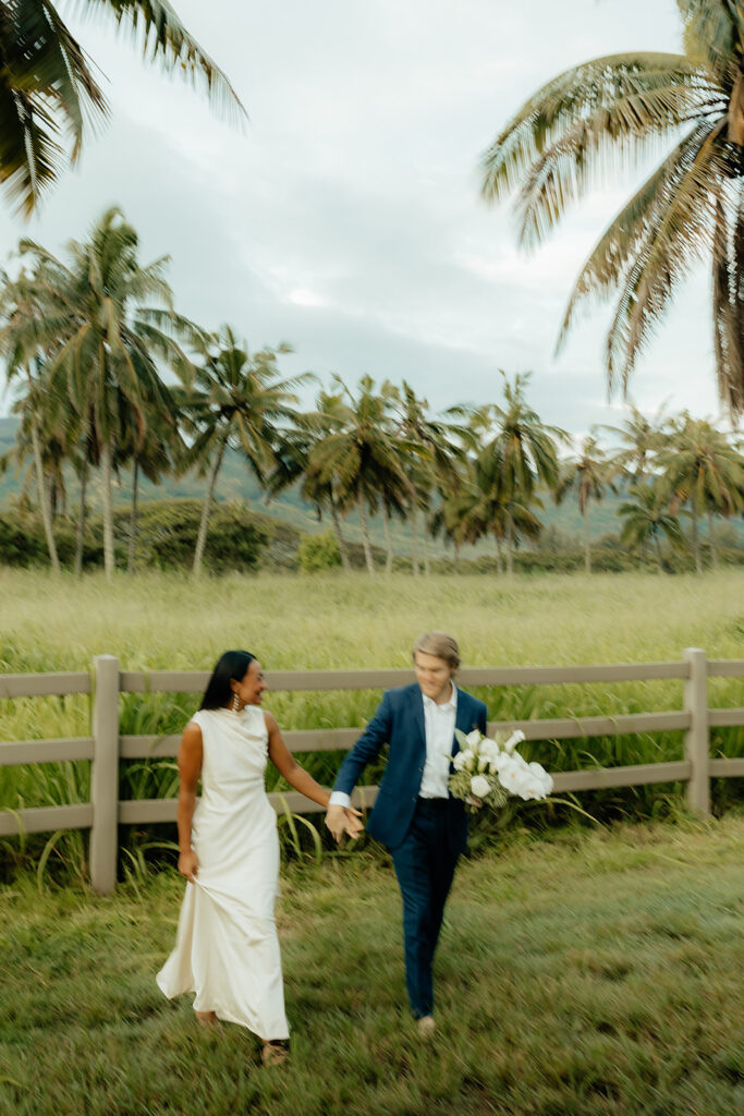 newly eloped couple walking around their venue