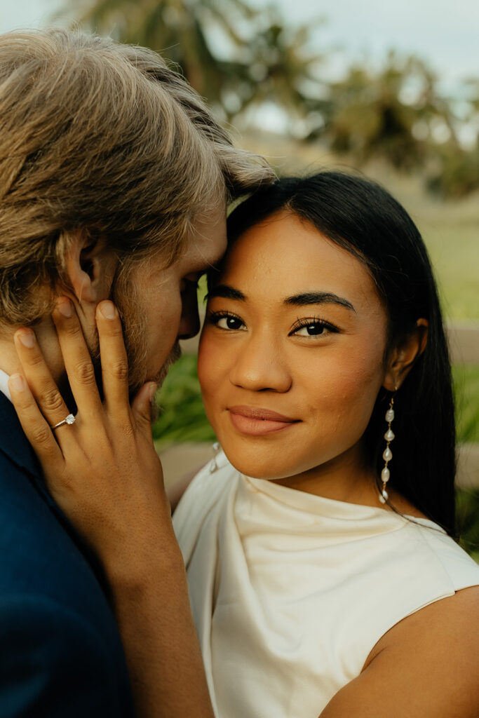 cute portrait of the bride and groom at their Intimate and Chic Sunrise Elopement in Oahu.