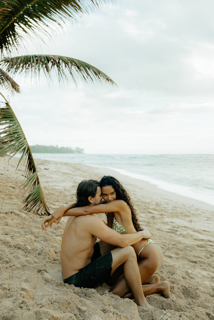 cute couple hugging at the beach