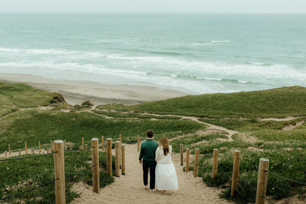 couple holding hands at their Fun and Ethereal Engagement Session 