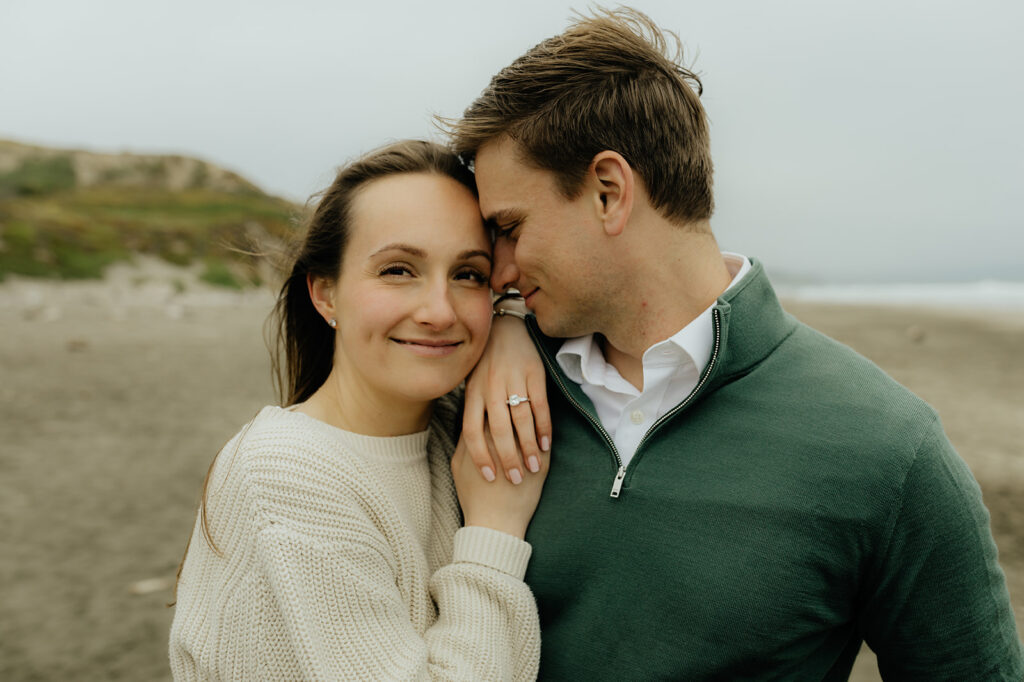 couple posing for the camera during their engagement session