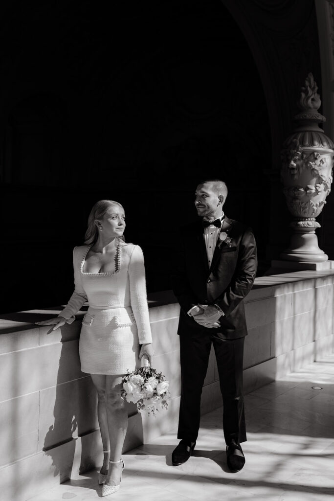 San Francisco City Hall Elopement couple in black and white image looking opposite directions