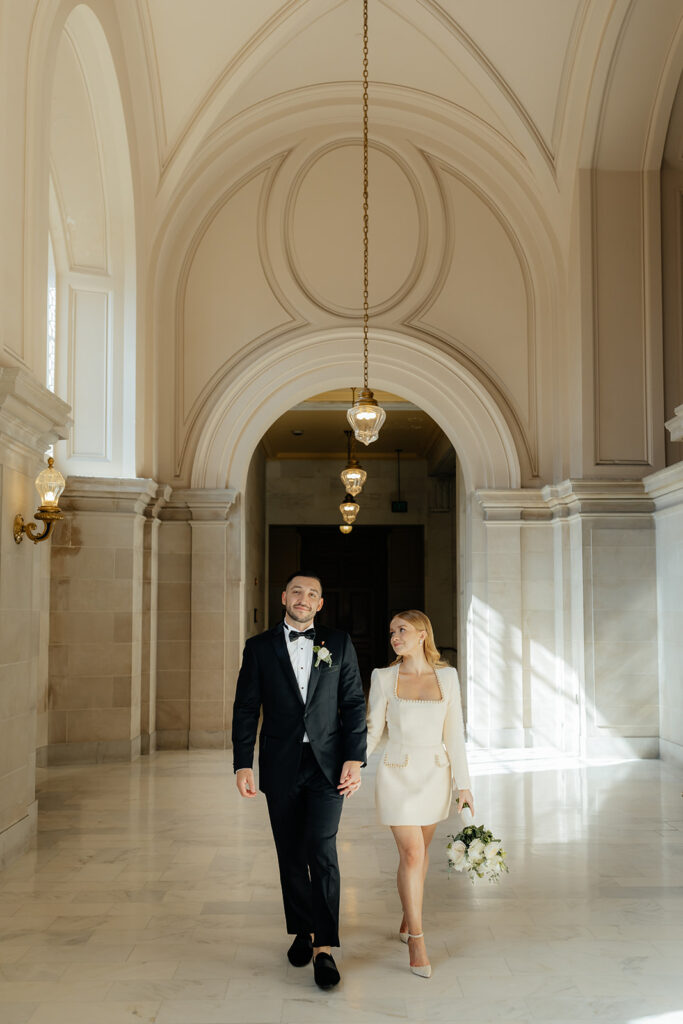 San Francisco City Hall Elopement couple walking down hallway