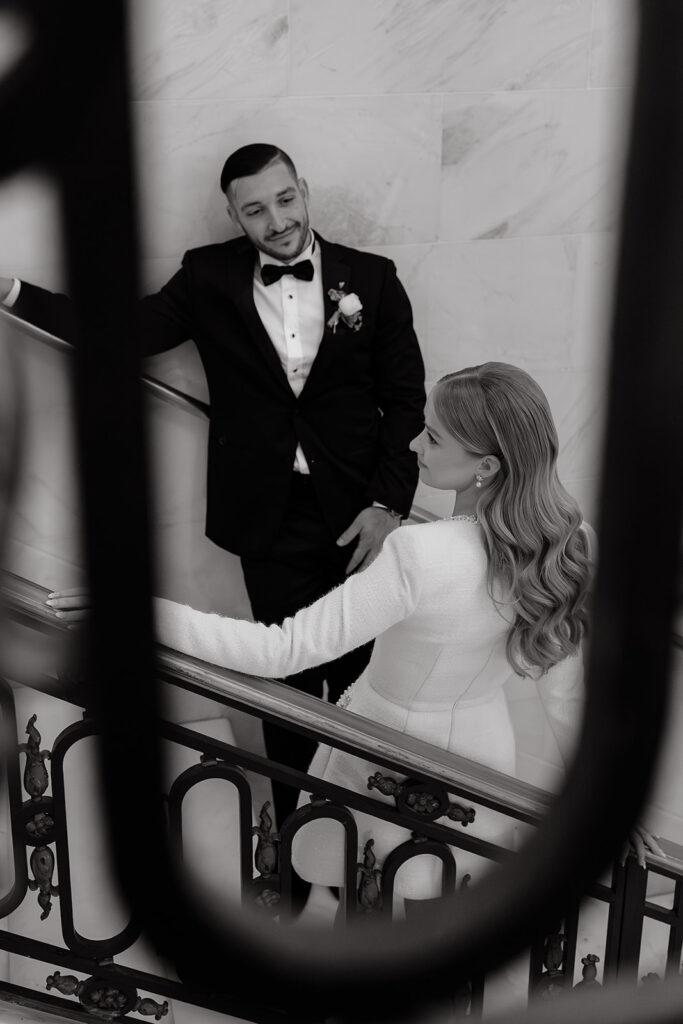 San Francisco City Hall Elopement couple through the staircase bars