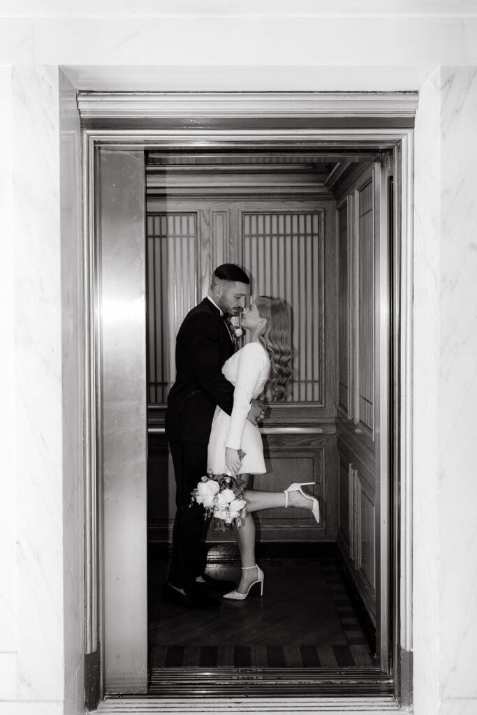 San Francisco City Hall Elopement couple in elevator in black and white image