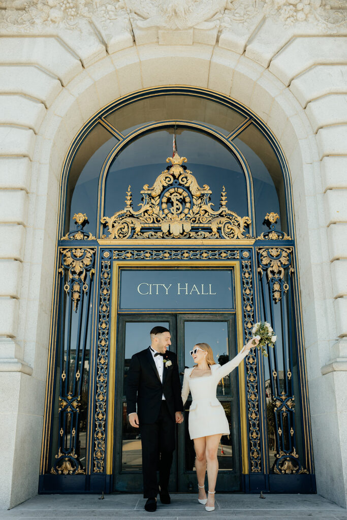 San Francisco City Hall Elopement couple walking out main doors