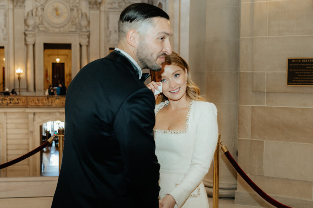 San Francisco City Hall Elopement ceremony bride wiping tears
