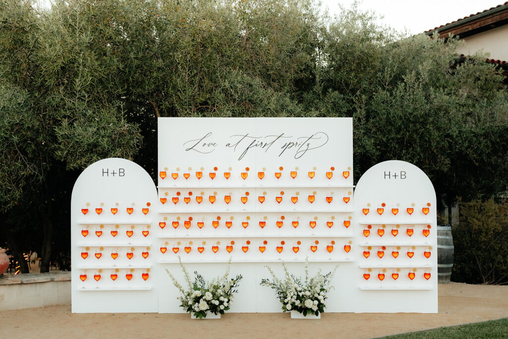 Clos LaChance Wedding seating chart with aperol spritz