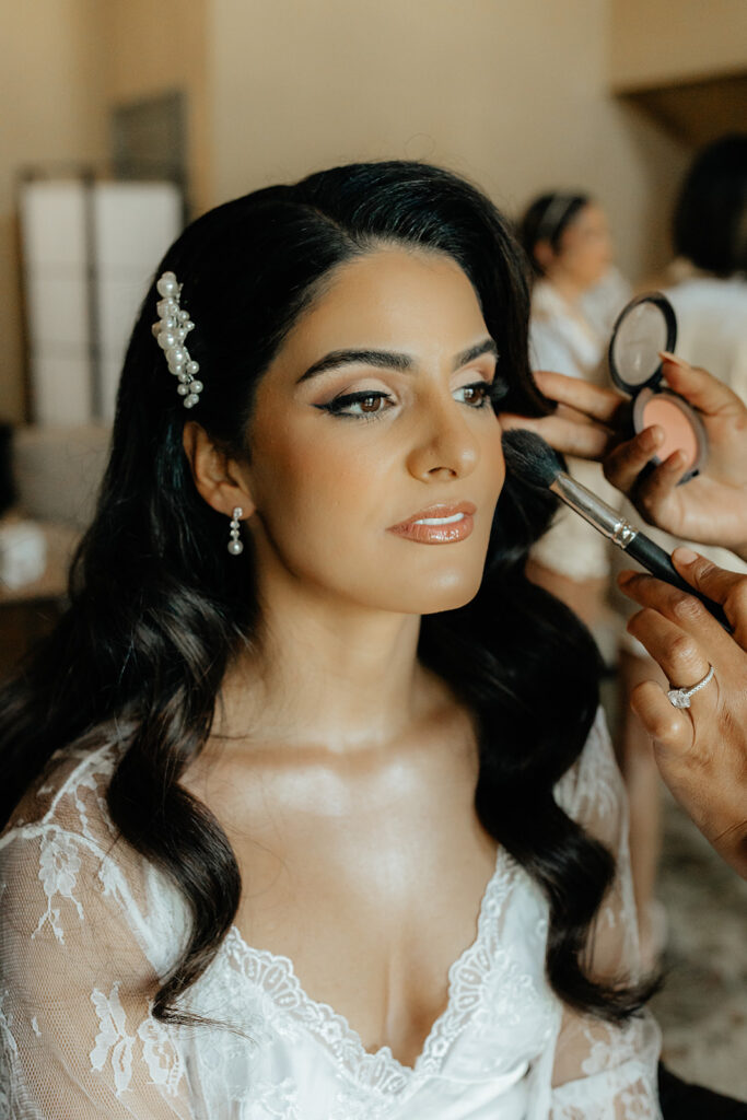 Clos LaChance Wedding - Bride getting makeup done