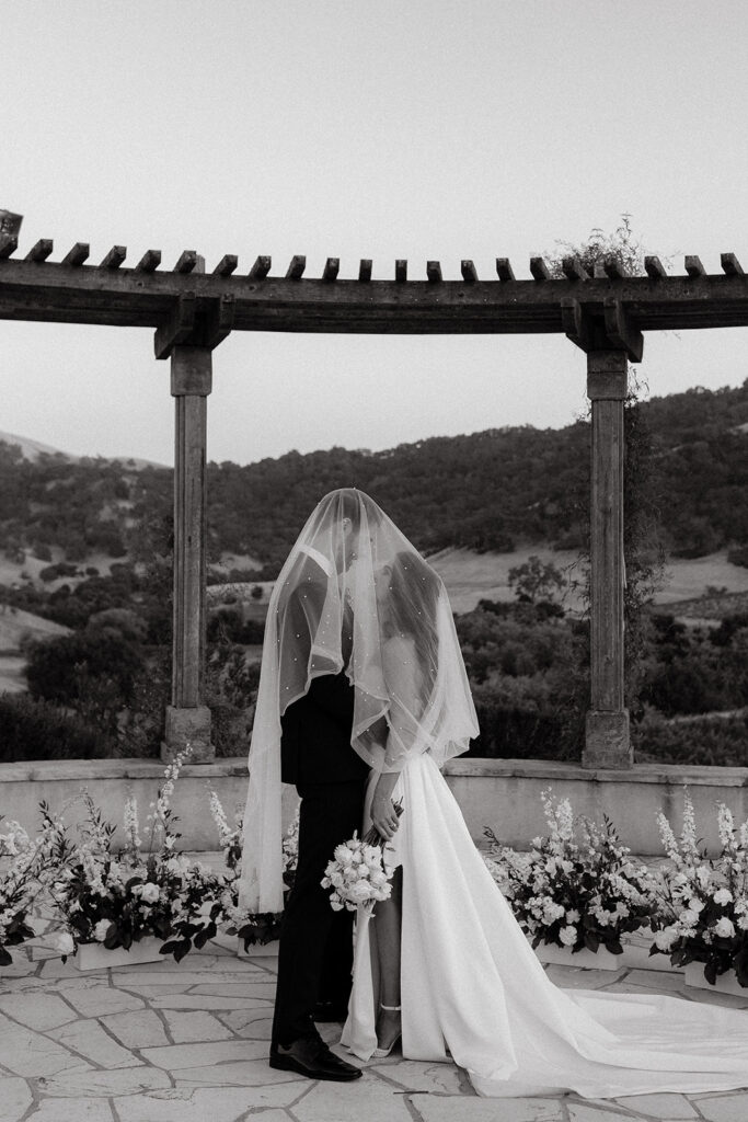 Clos LaChance Wedding - bride and groom under veil in black and white