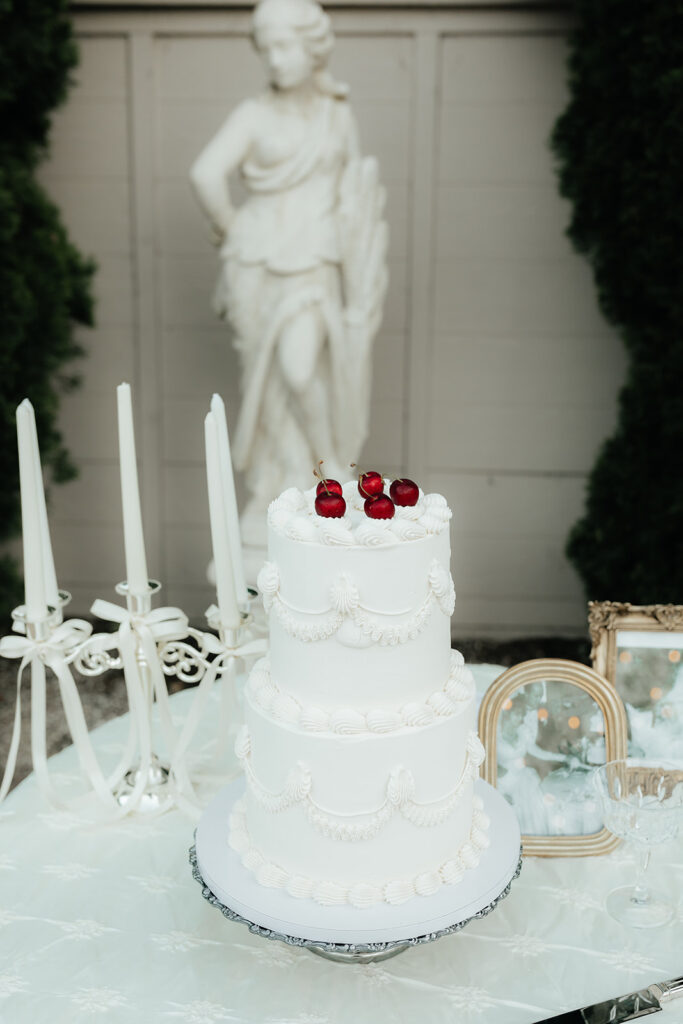 wedding vintage white cake with red cherries