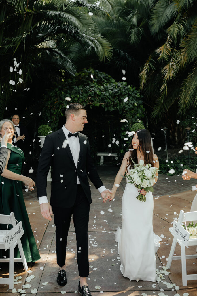 Grand island mansion wedding venue ceremony couple walking down aisle